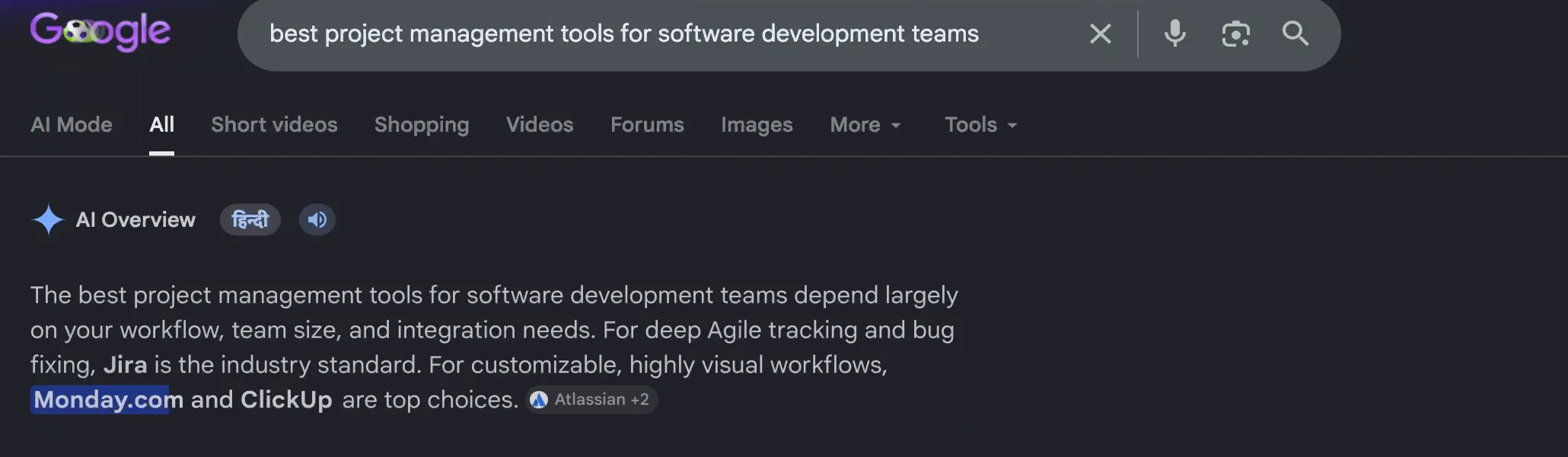 Google AI Overview at the top of the search results for "best project management tools for software development teams", answering directly and naming Jira, Monday.com, and ClickUp with a source chip.